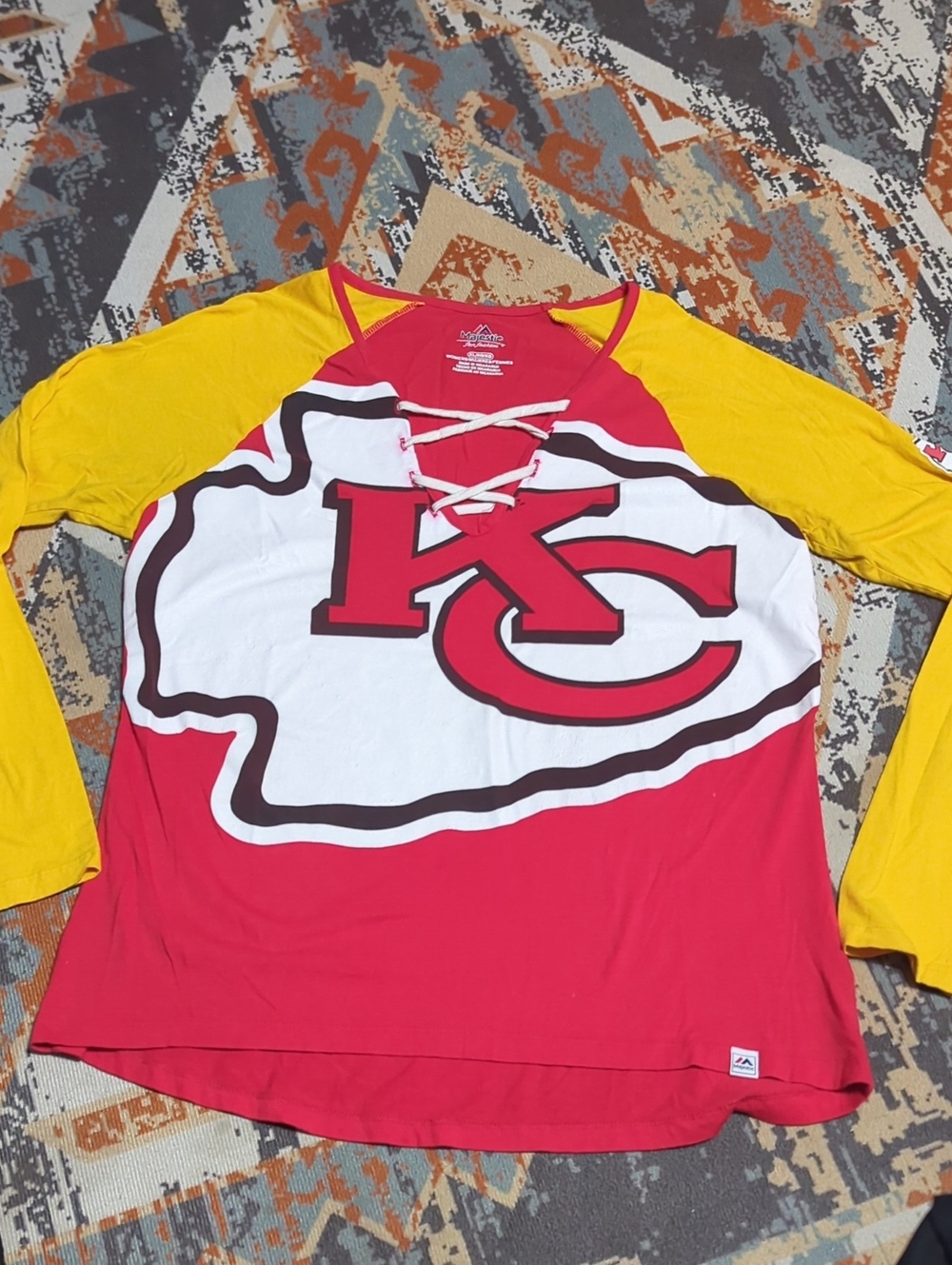 Kansas City Chiefs long-sleeve raglan shirt by Majestic a lace-up V-neck